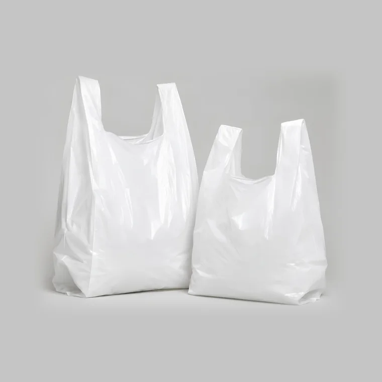 Two plain white vest carrier bags