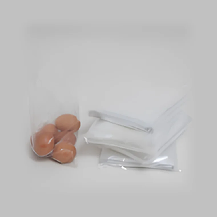Plain clear bags with eggs and folded bags