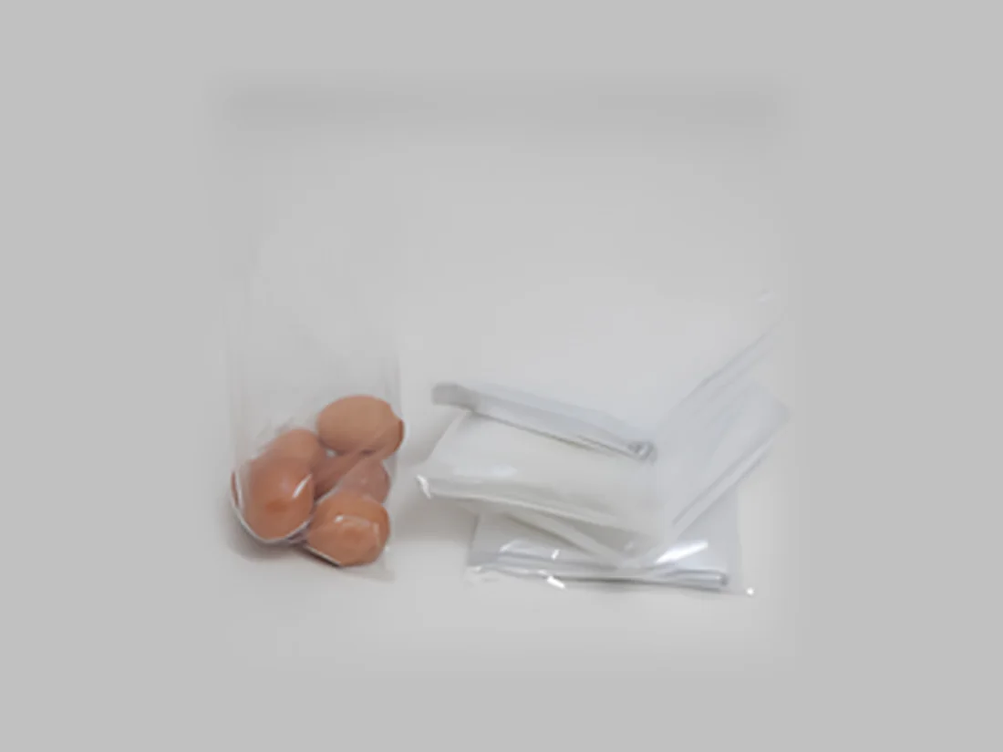 Plain clear bags with eggs and folded bags